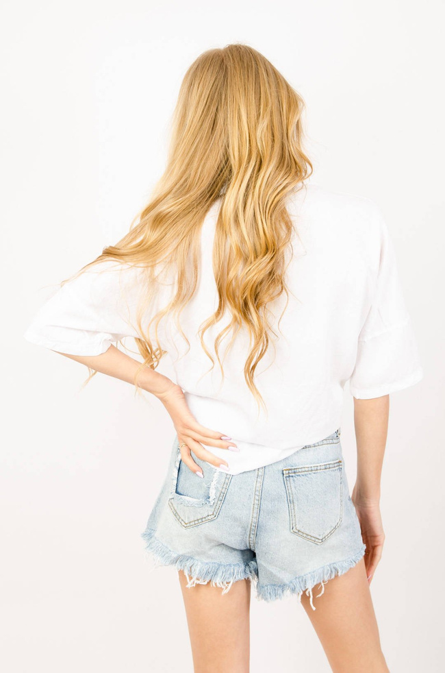 Biała bluzka koszulowa z wiązaniem