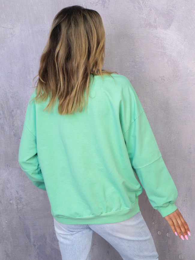 ASYMETRYCZNA BLUZA OVERSIZE Z PRZESZYCIAMI NA RĘKAWACH- ZIELONA