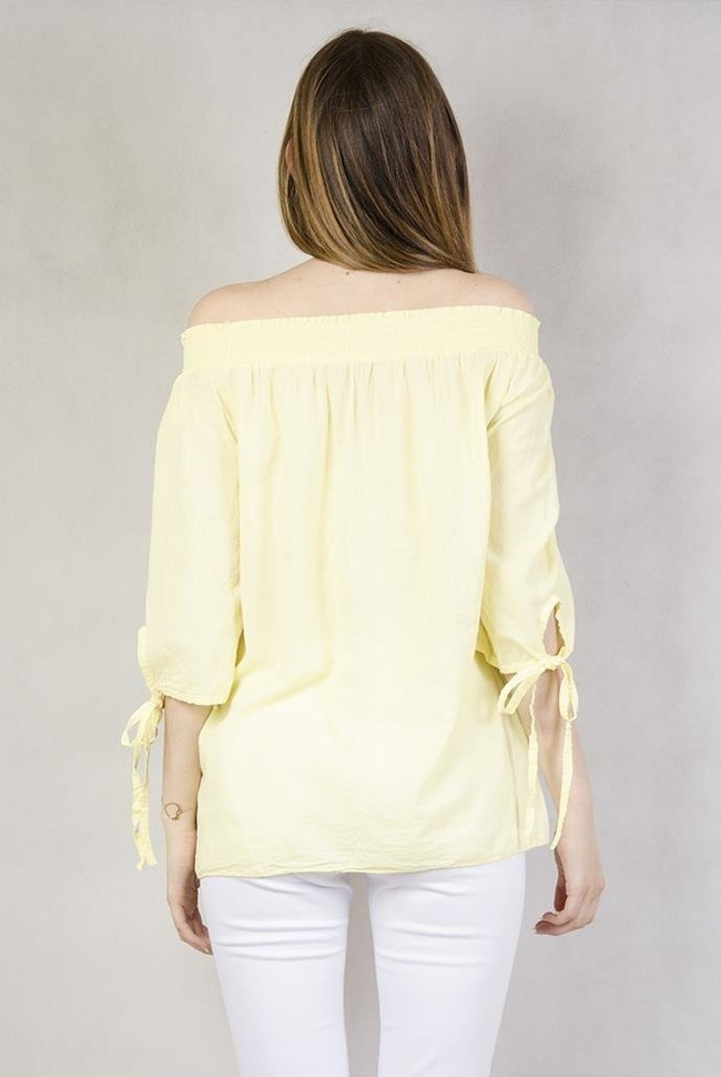 Żółta bluzka z granatowym haftem