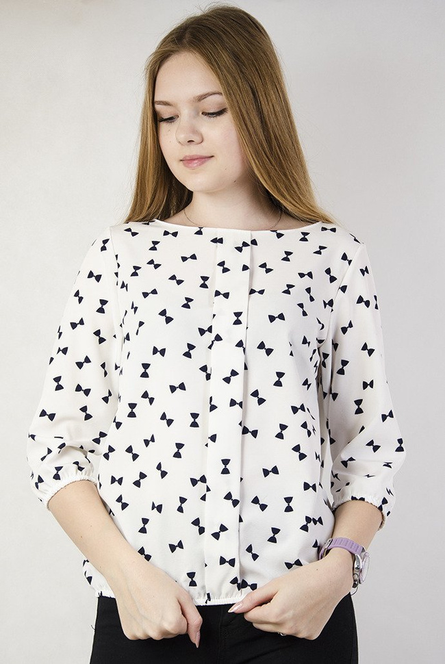 Biała bluzka w czarne kokardki