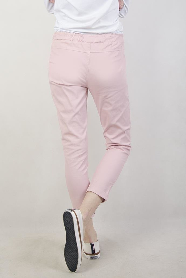 Jasnoróżowe spodnie z wiązaniem i gumą w pasie