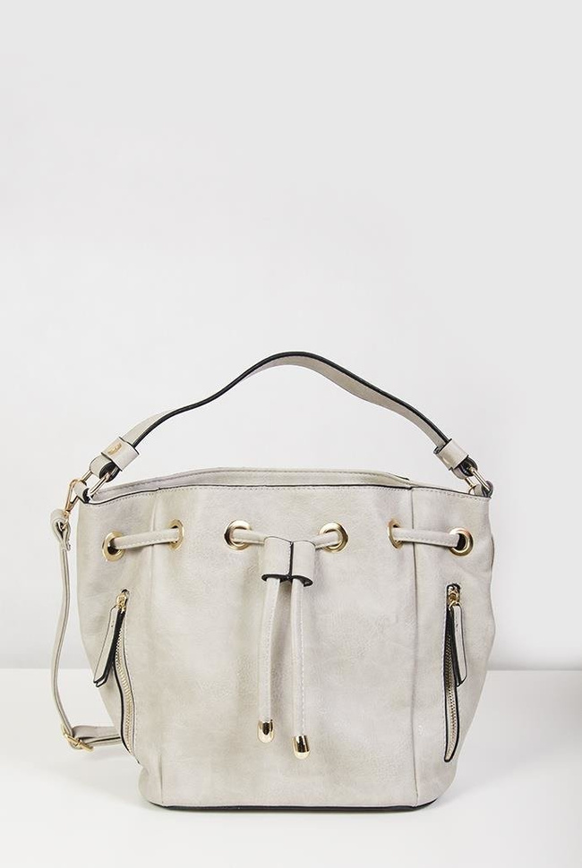 Kremowa torebka z przeplotem, zdobiona zamkami