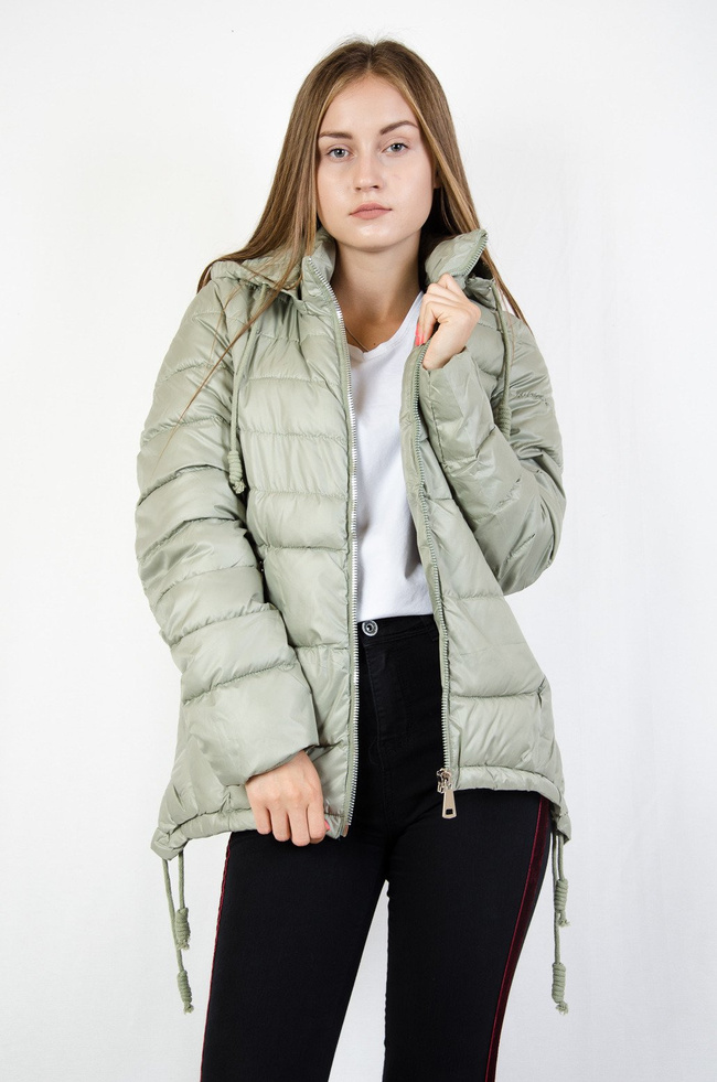Zielona pikowana kurtka z asymetrycznymi bokami
