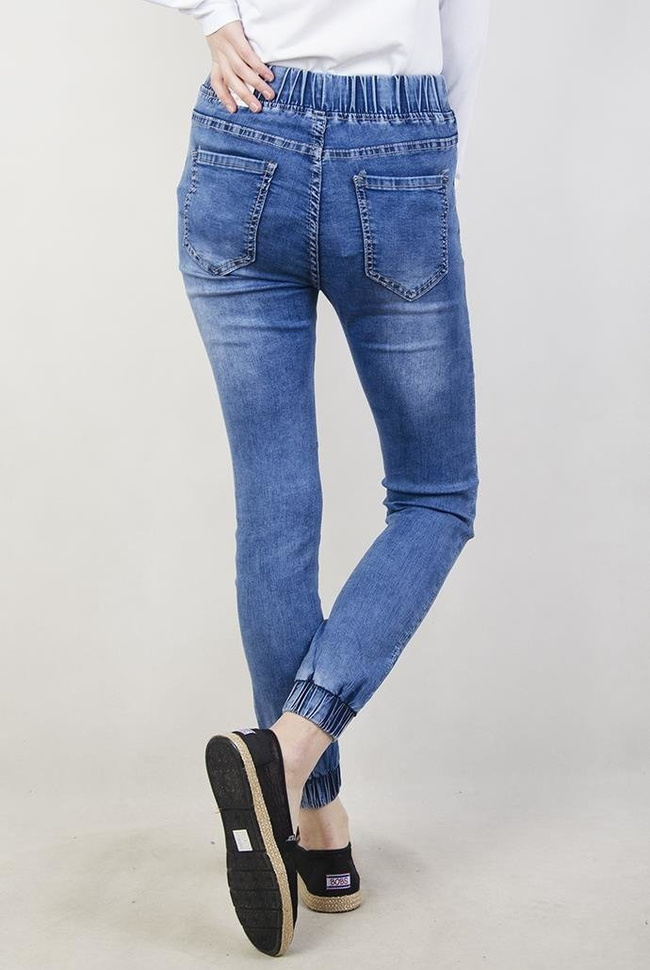 Spodnie jeansowe ze ściągaczami i sznurkiem w pasie