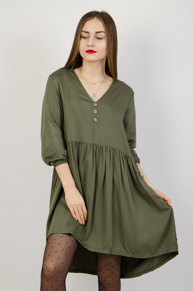 Zielona asymetryczna sukienka z rozszerzanym dołem