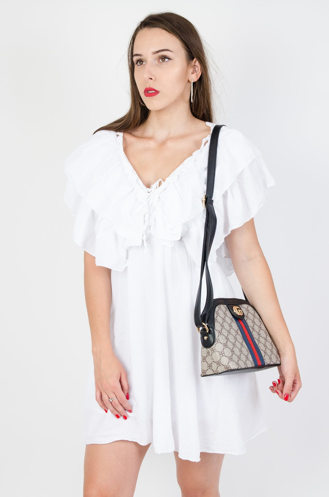 Wzorzysta torebka z czerwono-granatowym paskiem na przodzie