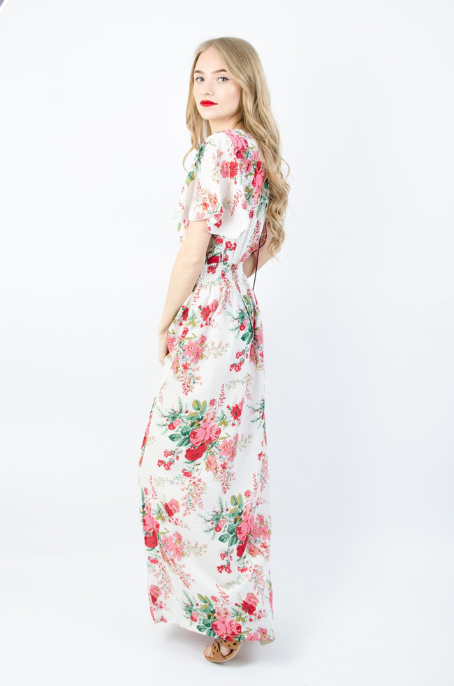 Biała długa sukienka w kwiaty z gumą w pasie