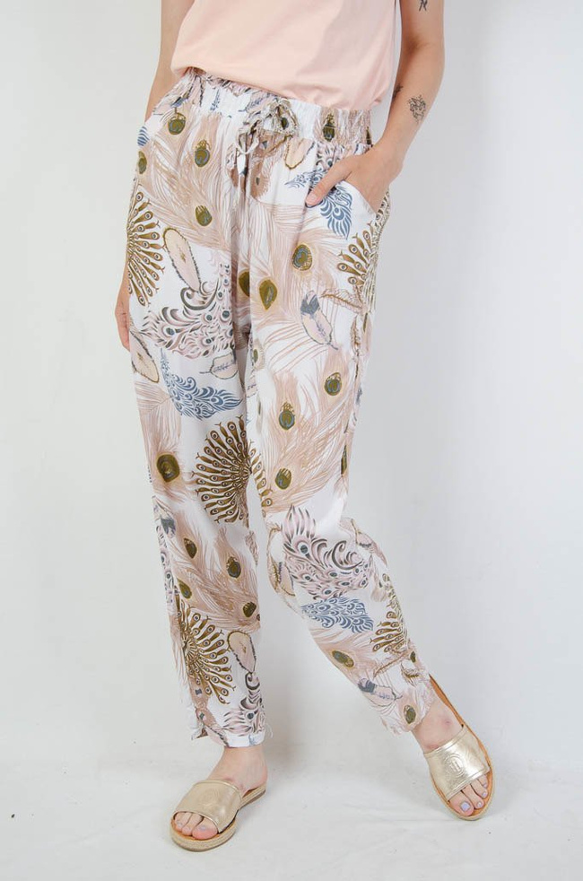 Białe spodnie alladynki z motywem pawiego oka