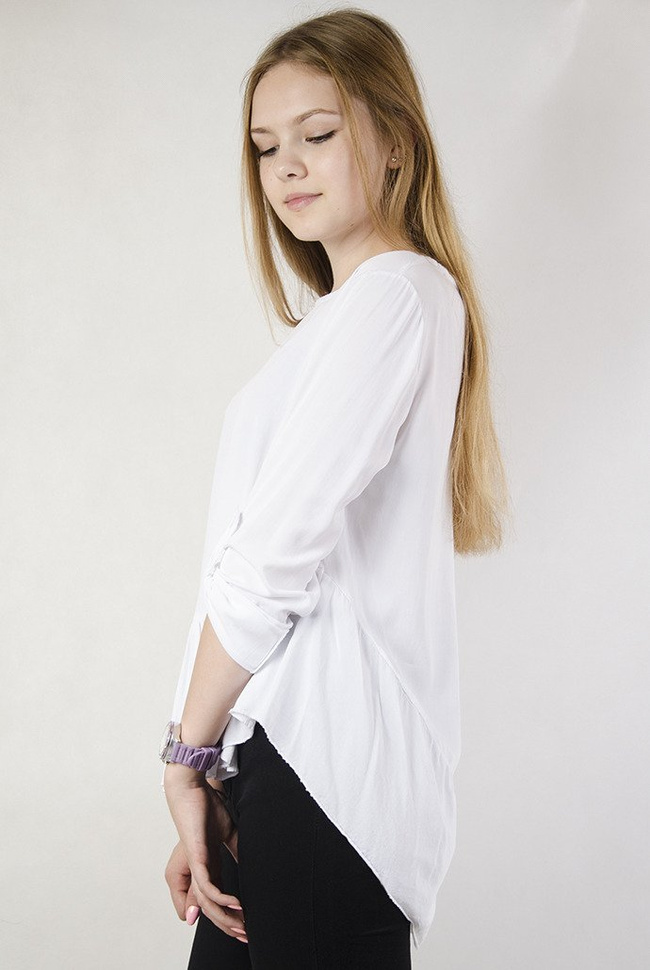 Biała, asymetryczna bluzka z odcięciem na dole