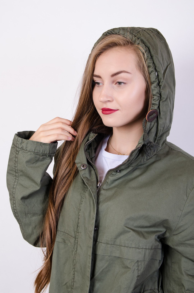 Zielona, asymetryczna kurtka parka