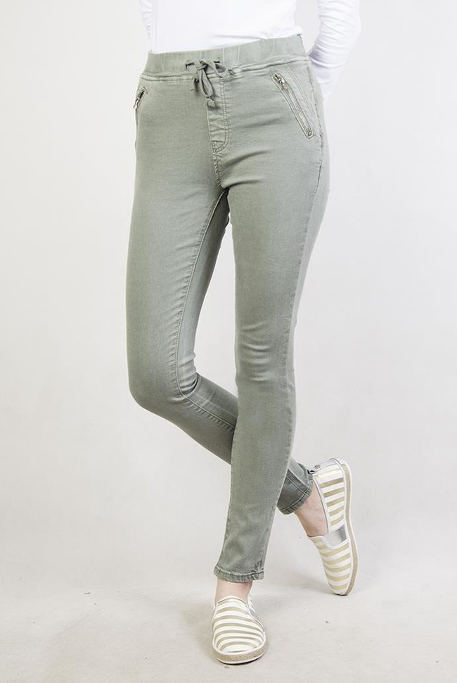 Zielone spodnie z zamkami i gumą w pasie