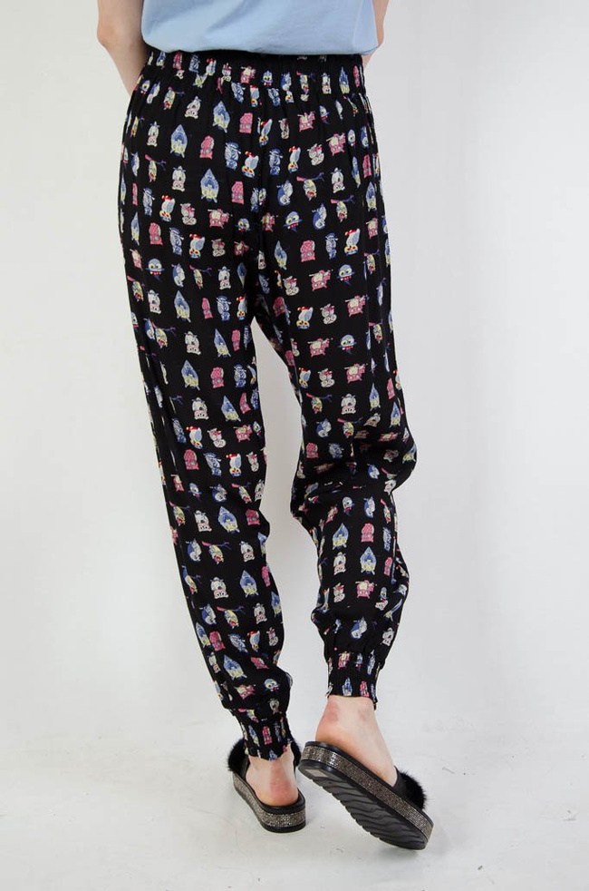 Czarne spodnie alladynki w sowy