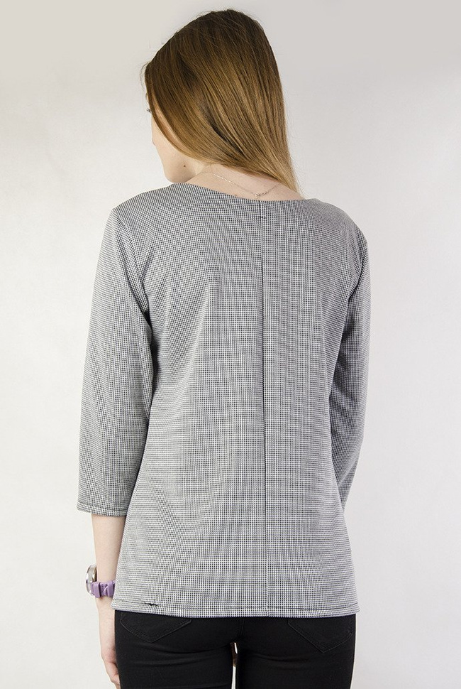 Elegancka bluzka w pepitkę z czarną kokardą