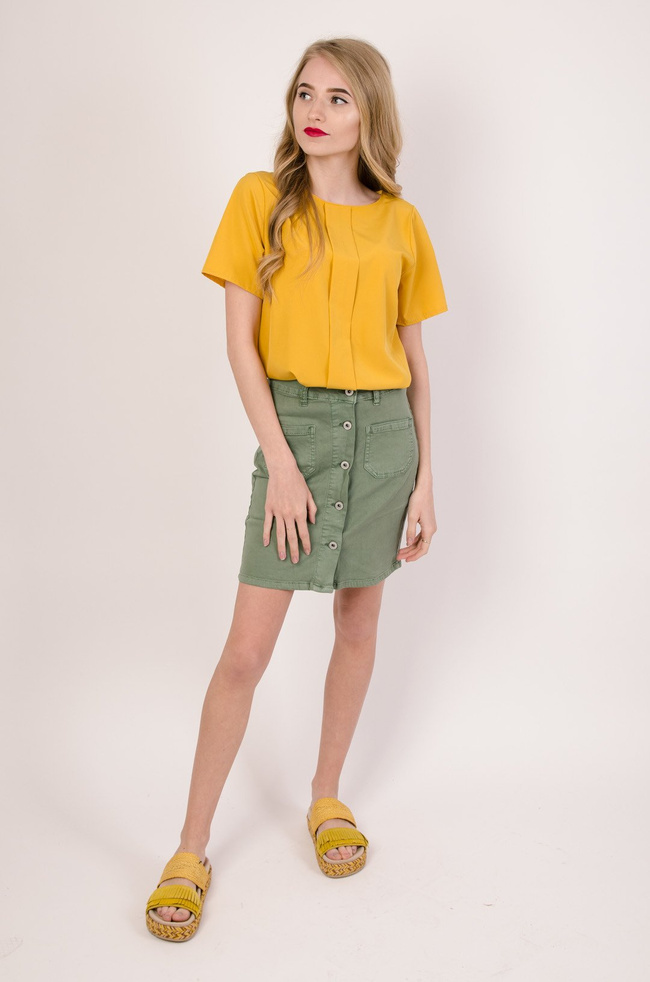 Żółta bluzka z zakładką oraz gumką na dole