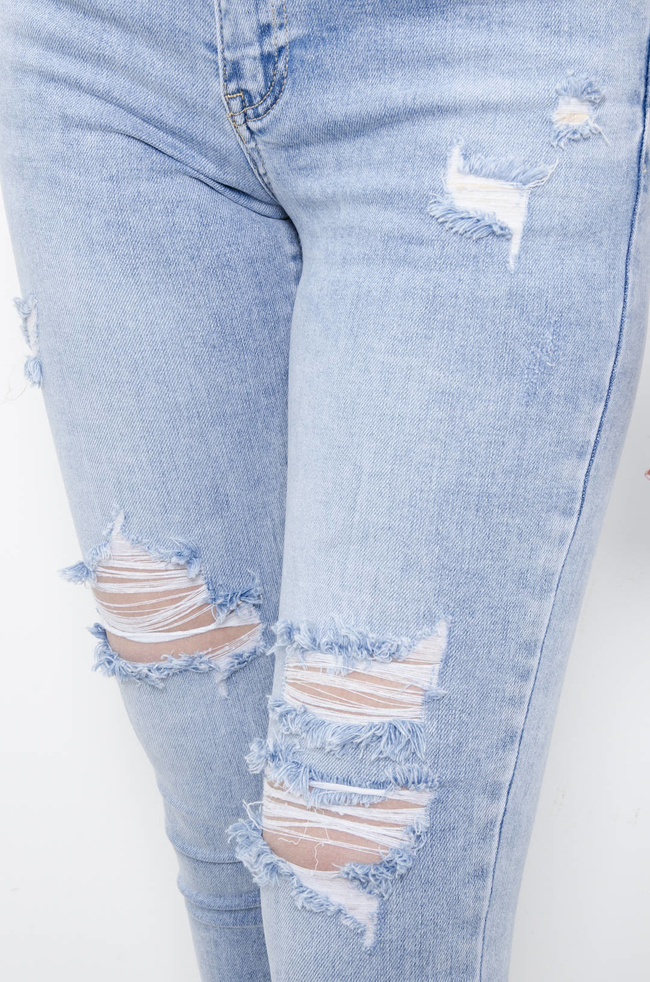 SPODNIE JEANSOWE PUSH UP Z PRZETARCIAMY