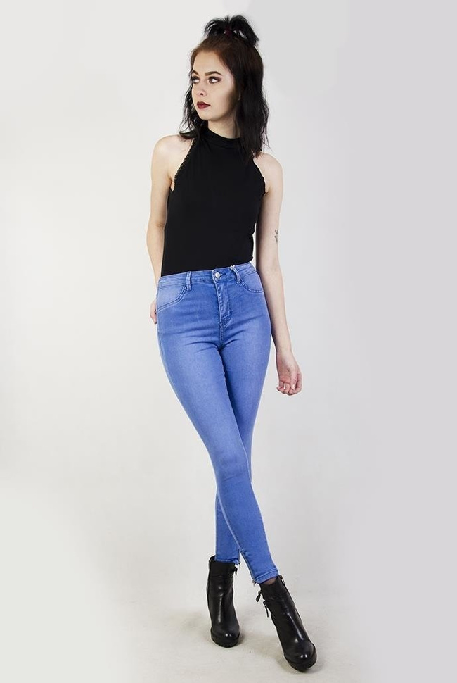 Jasnoniebieskie spodnie jeansowe z zamkami