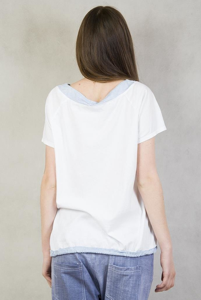 Biała bluzka z sercem, wiązana na sznurek