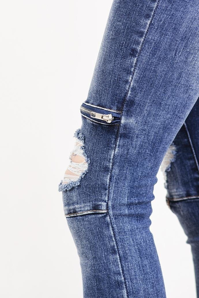 Spodnie jeansowe z zamkami na kolanach