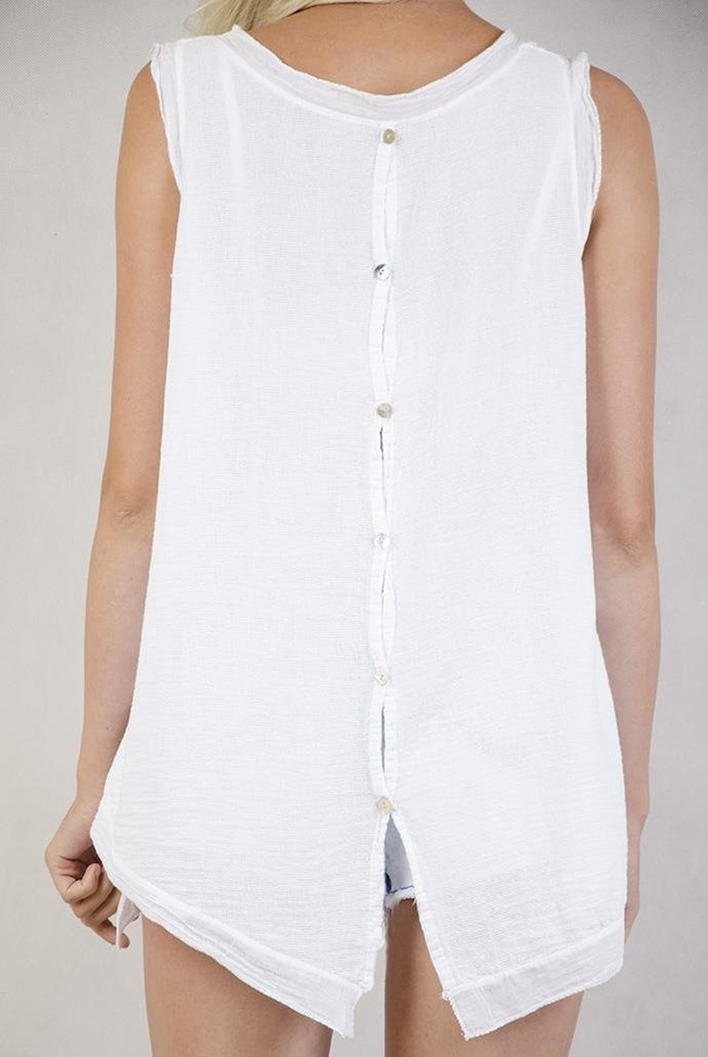 Biała bluzka z asymetrycznymi bokami ozdobiona srebrną nitką