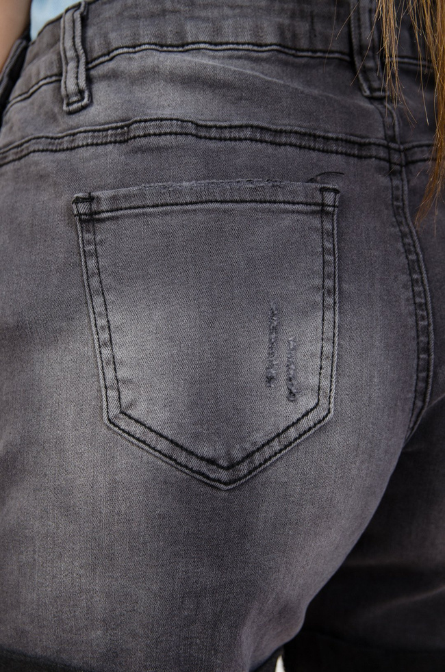 Ciemno szare ogrodniczki z szarpaniami