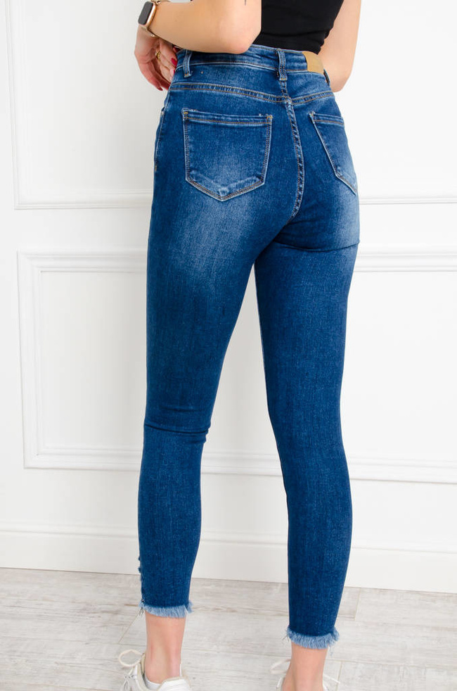 SPODNIE JEANSOWE SKINNY Z PRZETARCIAMI NA DOLE NOGAWKI