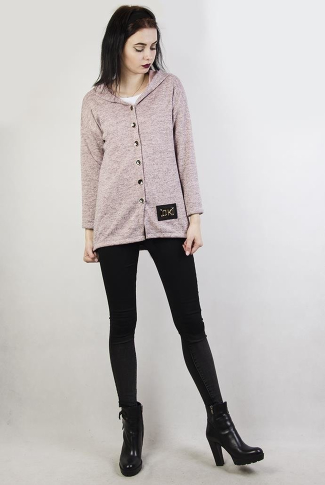 Różowa bluzka zapinana na guziki, z wiązaniem z tyłu