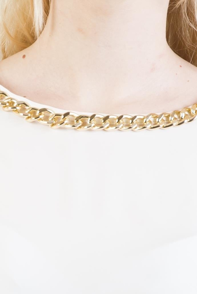 Biała bluzka z przedłużanym tyłem