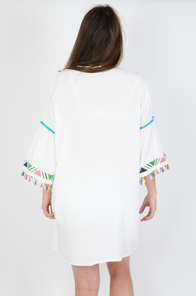 Biało-neonowa bluzka z pomponami