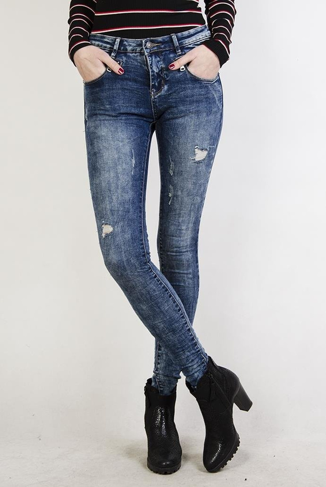 Spodnie jeansowe z zamkami, pogniecione przy nogawkach