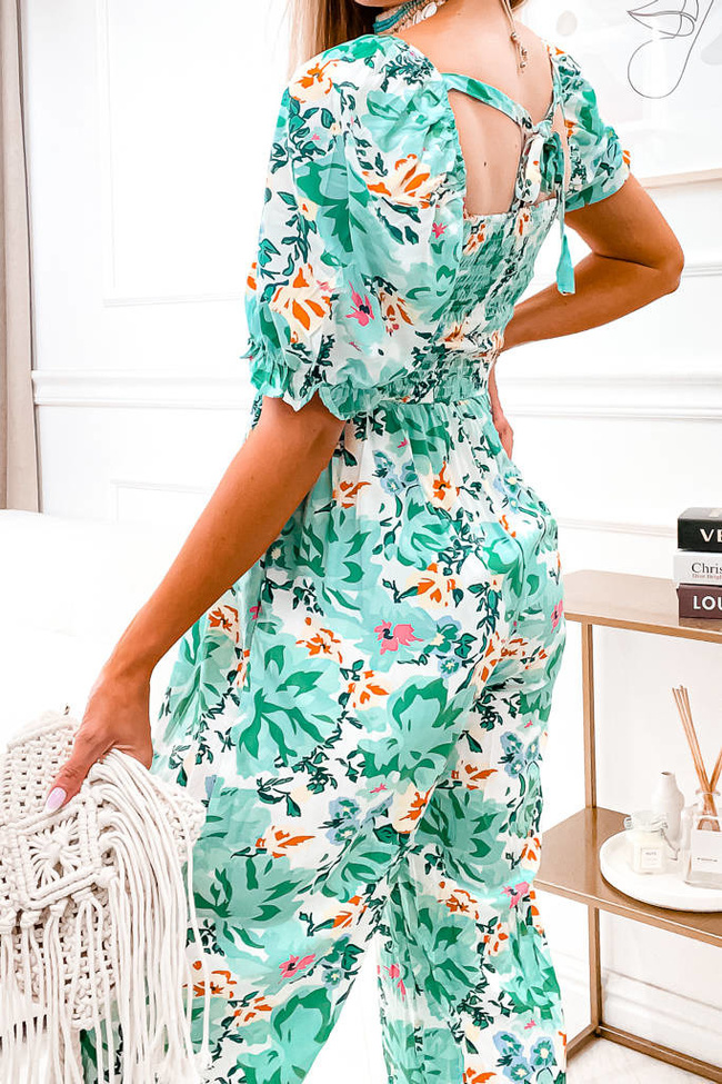 KOMBINEZON W KWIATY Z DOPASOWANA GÓRĄ I BUFIASTYMI RĘKAWAMI- ZIELONY