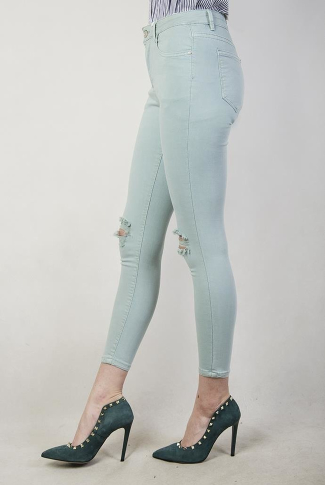 Jasnozielone spodnie jeansowe z wycięciami i wysokim stanem
