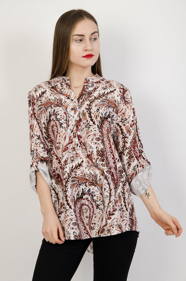 Biała wzorzysta bluzka zapinana na guziki