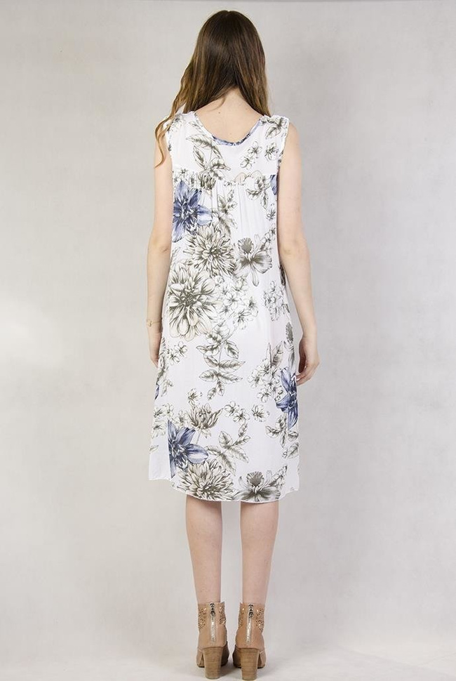 Biała sukienka w kwiaty wykończona koronką