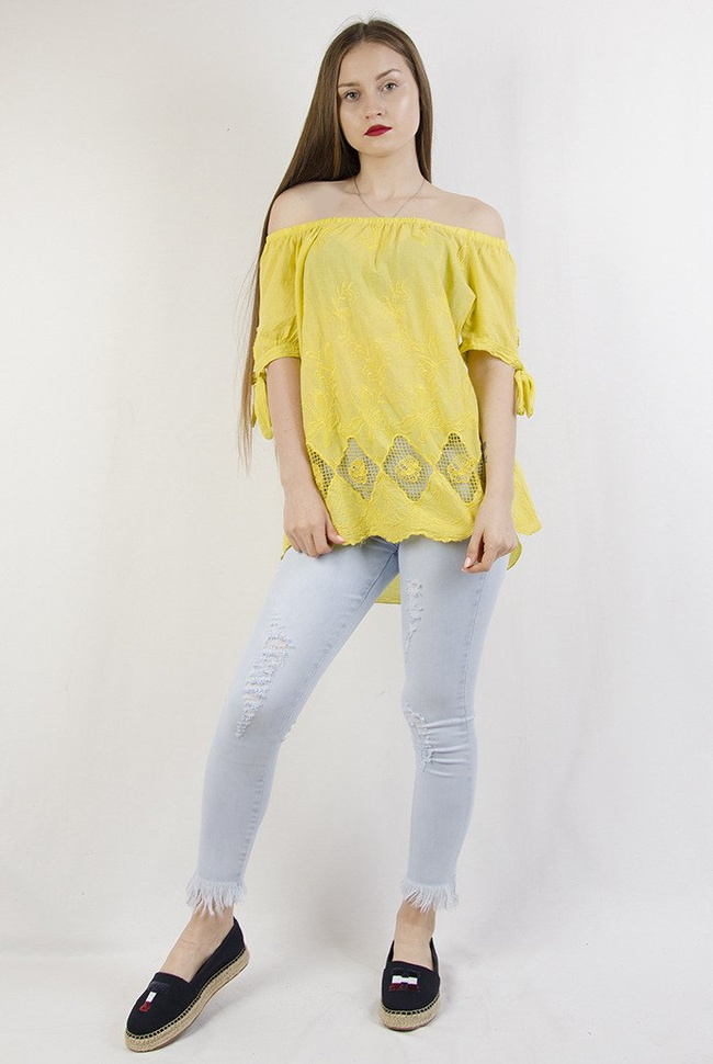 Żółta bluzka ze wzorami na dole