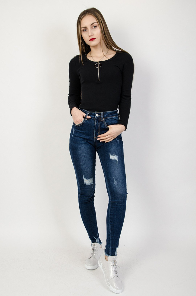 Granatowe spodnie jeansowe z przetarciami