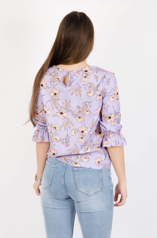 Fioletowa bluzka w pomarańczowe kwiaty z falbaną