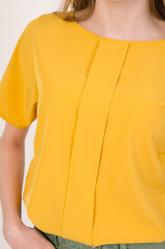 Żółta bluzka z zakładką oraz gumką na dole