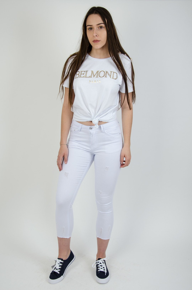 Białe spodnie z przetarciami