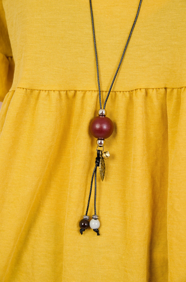 Żółta bluzka z rozkloszowanym dołem