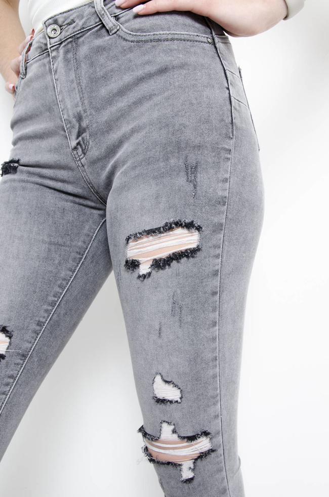 SPODNIE JEANSOWE SZARE PUSH UP Z SZARPANIAMI