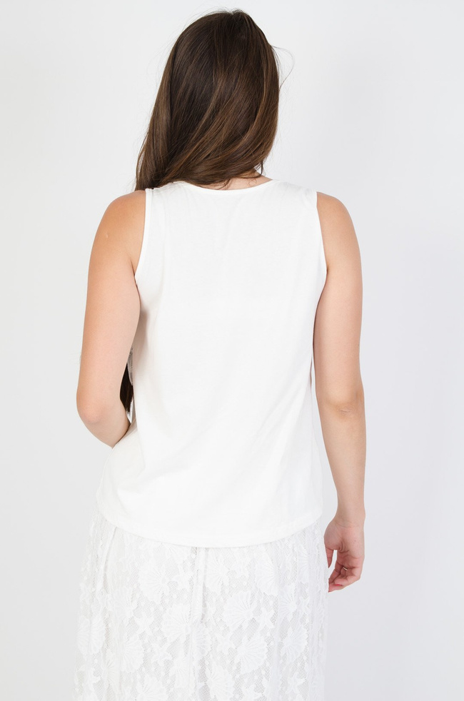 Bluzka zdobiona złotymi cekinami i warstwową koronką