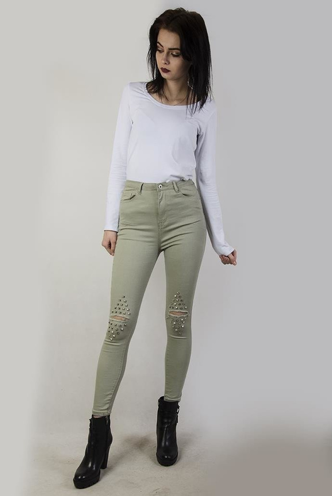 Jasnozielone spodnie skinny jeans z ćwiekami i dziurami