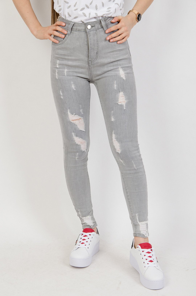 Jasno szare spodnie jeansowe z przetarciami 