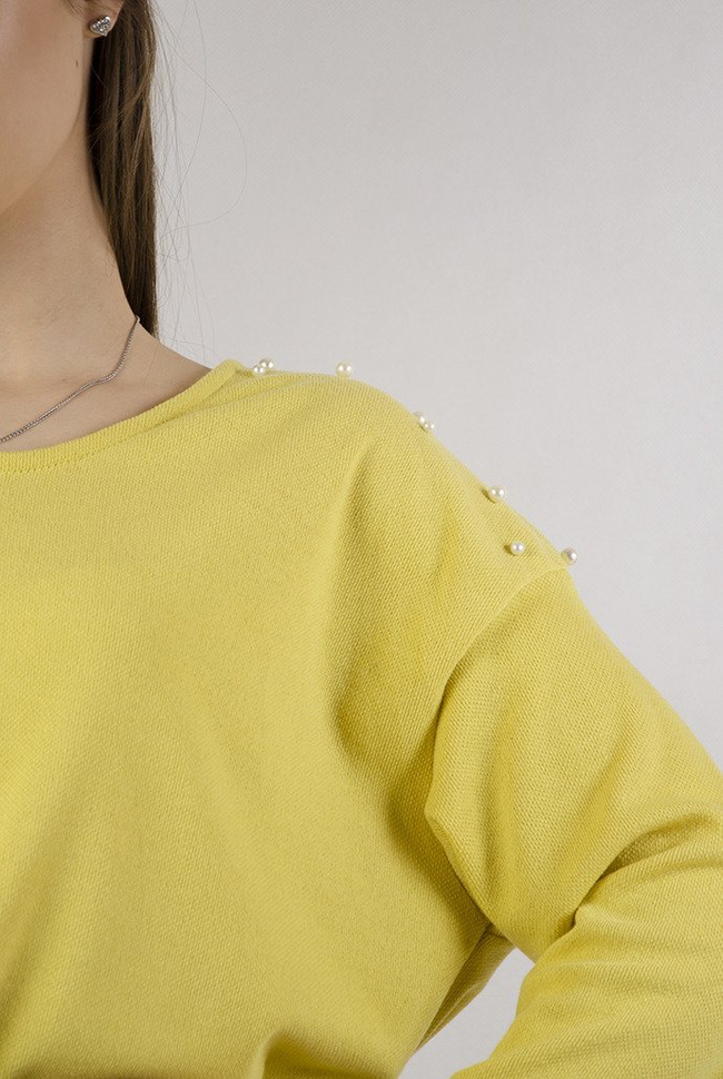 Żółta asymetryczna tunika z perełkami oraz wycięciem na plecach