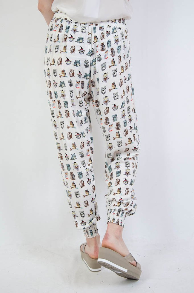 Białe spodnie alladynki w sowy