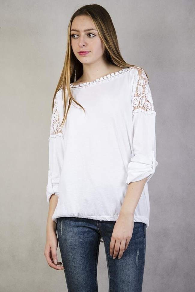 Biała bluzka z ażurowymi wstawkami i wiązaniem na dole