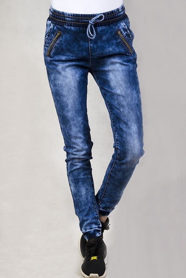 Ciemne spodnie jeansowe ze ściągaczami