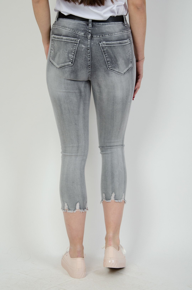 Szare cieniowane spodnie jeansowe 7/8 z szarpaniem na dole nogawki
