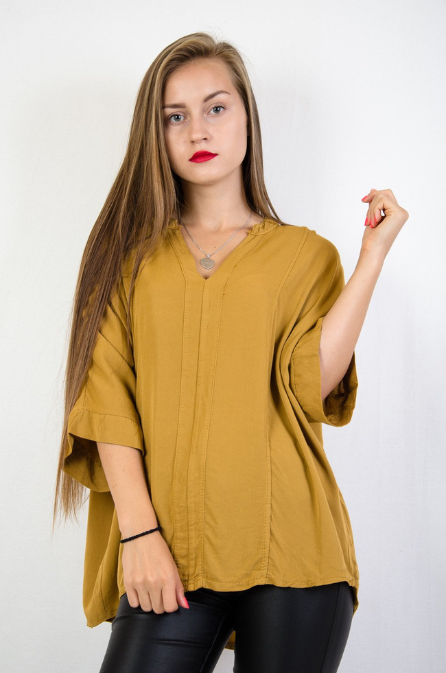 Żółta bluzka nietoperz z przedłużanym tyłem