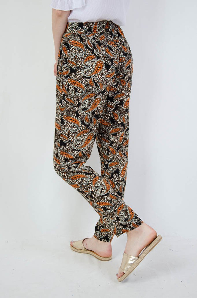 Długie spodnie alladynki w pomarańczowe wzory